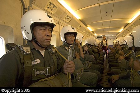 Border Patrol Police: Members of the Royal Thai Police preparing for a static line jump. Hua Hin, Thailand.