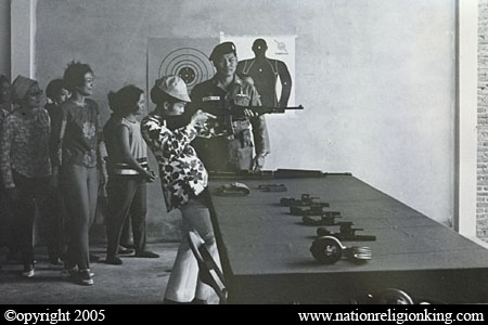 Border Patrol Police: Queen Sirikit firing an M1 Carbine at PARU HQ, Hua Hin. Reproduction of a photograph taken in the early 1970s and hanging at the shooting range at PARU HQ.