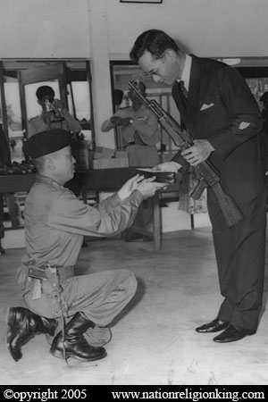 Border Patrol Police: King Bhumibol receiving an AK-47 at PARU HQ, Hua Hin. Reproduction of a photograph taken in the early 1970s and hanging at the shooting range at PARU HQ.